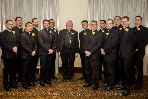 New priests with Cardinal Collins